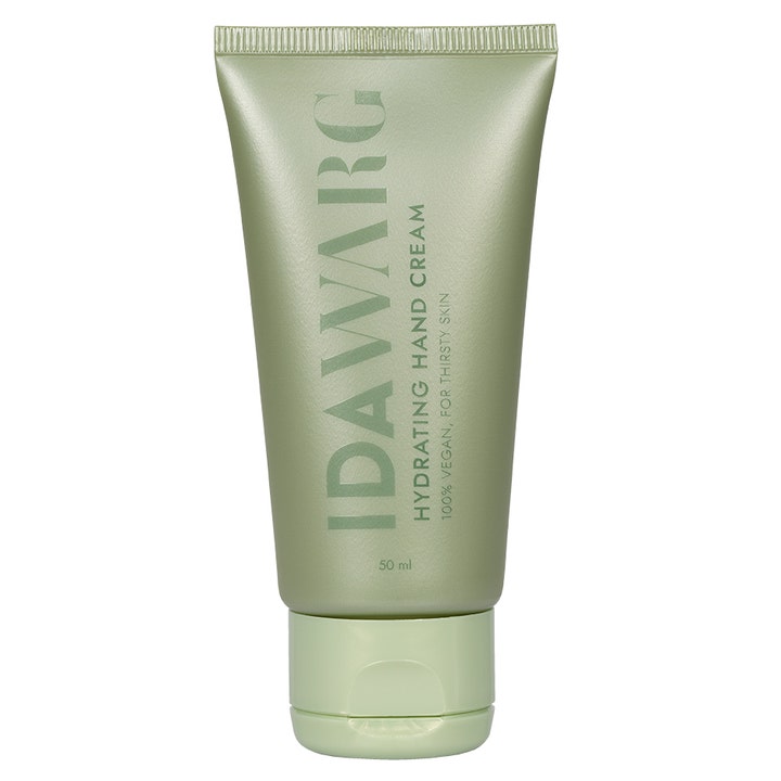 Ida Warg Hydrating Hand Cream 50 ml gir fukt i en olivengrønn tube med matt finish og matchende lokk.